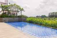 Kolam Renang New and Cozy 2BR at Marigold Nava Park Apartment By Travelio