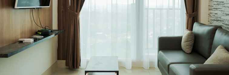 Lobi Cozy and Comfort 1BR at Tree Park City BSD Apartment By Travelio