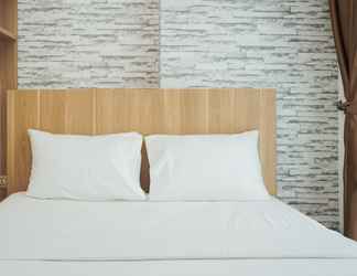 Bedroom 2 Cozy and Comfort 1BR at Tree Park City BSD Apartment By Travelio