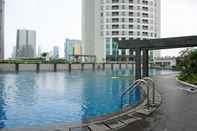 Swimming Pool Best Location 2BR Apartment at The Wave Kuningan By Travelio