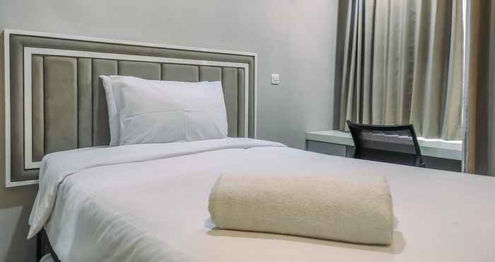 Bedroom Tidy and Comfy 2BR at Vida View Apartment By Travelio