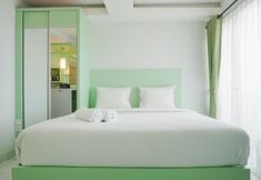 Bedroom 6 Cozy Studio Apartment at Amethyst By Travelio