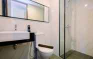 Toilet Kamar 5 Great Deal Studio at The Newton Ciputra World 2 Apartment By Travelio