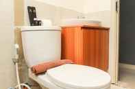 In-room Bathroom High Floor and Comfortable 2BR at Meikarta Apartment By Travelio