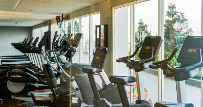 Fitness Center Cozy Living Studio at Menteng Park Apartment By Travelio