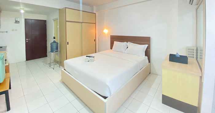 Bilik Tidur Spacious Studio Room Apartment with Sofa Bed at Emerald Towers By Travelio