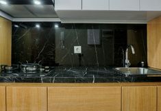 พื้นที่สาธารณะ 3 Well Appointed Studio at Ciputra World 2 Apartment By Travelio Premium