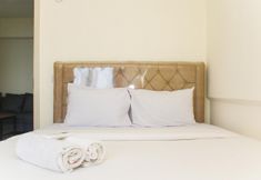 Bedroom 2 Homey and Comfortable 3BR at Meikarta Apartment By Travelio