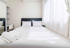 Bedroom 7 Simple and Comfort 2BR at Pakubuwono Terrace Apartment By Travelio