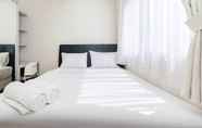 Bedroom 7 Simple and Comfort 2BR at Pakubuwono Terrace Apartment By Travelio