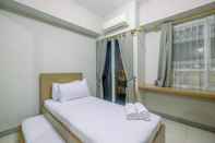 Kamar Tidur Comfort Studio Apartment at Taman Melati Margonda By Travelio