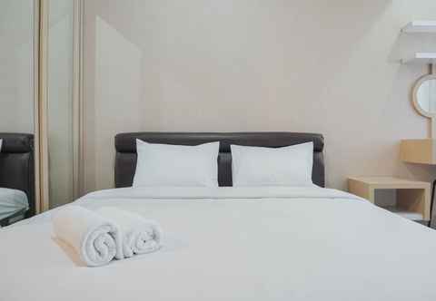 Bedroom Stunning Studio at The Nest Puri Apartment By Travelio