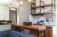 Common Space Simply and Homey 2BR at Lagoon Apartment By Travelio