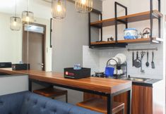 Common Space 4 Simply and Homey 2BR at Lagoon Apartment By Travelio