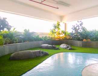 Bangunan 2 Stunning and Cozy Grand Kamala Lagoon Studio Apartment By Travelio