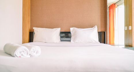 寝室 2 Modern and Compact Studio Room at Casa De Parco Apartment By Travelio