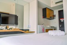 共用スペース Modern and Compact Studio Room at Casa De Parco Apartment By Travelio