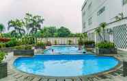 Swimming Pool 7 Comfort Living Studio Apartment at Margonda Residence 5 By Travelio