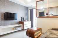 Lobby Enchanting 2BR at Tamansari Papilio Apartment By Travelio