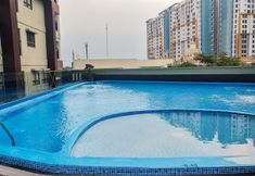 Swimming Pool 6 Cozy and Nice 2BR Apartment at Atria Residence By Travelio