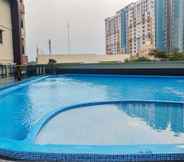 Swimming Pool 6 Cozy and Nice 2BR Apartment at Atria Residence By Travelio