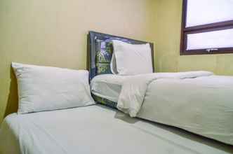 Bedroom 4 Cozy and Nice 2BR Apartment at Atria Residence By Travelio