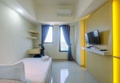 Ruang Umum 2 Cozy Living Studio Room Apartment at Evenciio Margonda By Travelio
