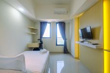 Ruang Umum Cozy Living Studio Room Apartment at Evenciio Margonda By Travelio