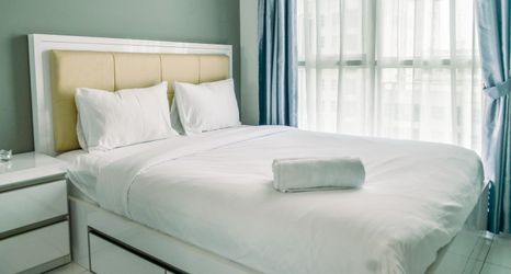 Bedroom 2 Cozy Living 1BR Apartment at Casa de Parco By Travelio