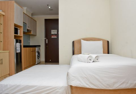 Bedroom Comfy and Stunning Studio at Menteng Park Apartment By Travelio