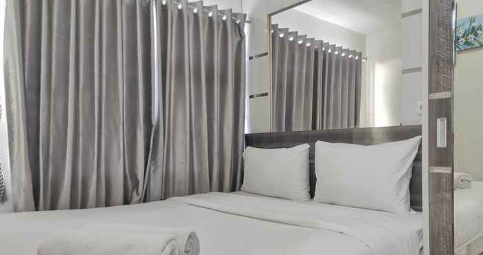 Bedroom Cozy and Best Deal 2BR Vida View Apartment By Travelio