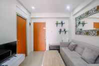 Ruang Umum Cozy Living and Simple 2BR at Cibubur Village Apartment By Travelio