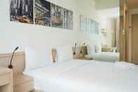 Bedroom Comfortable Studio near ICE BSD at Tree Park Apartment By Travelio