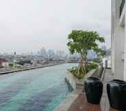 Swimming Pool 5 Nice and Fancy Studio Apartment at Nine Residence By Travelio