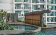 Swimming Pool 6 Nice and Fancy Studio Apartment at Nine Residence By Travelio