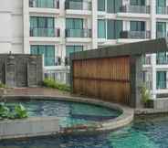 Swimming Pool 6 Nice and Fancy Studio Apartment at Nine Residence By Travelio
