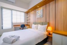 卧室 Good Deal Studio near UI at Evenciio Apartment Margonda By Travelio