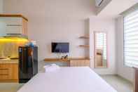 Common Space Good Deal Studio near UI at Evenciio Apartment Margonda By Travelio