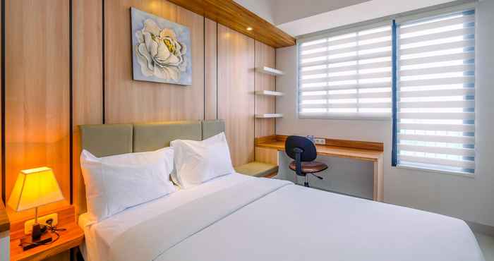 Kamar Tidur Cozy Living Studio near UI at Evenciio Apartment Margonda By Travelio