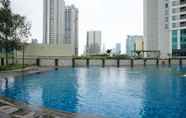 Kolam Renang 6 Homey and Nice 1BR at The Wave Kuningan Apartment By Travelio