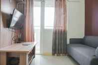 Common Space Cozy Living 2BR next to Mall at Green Pramuka City Apartment By Travelio