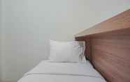 Bedroom 2 Cozy Living 2BR next to Mall at Green Pramuka City Apartment By Travelio