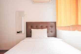 Bedroom 4 Comfort Living 2BR Apartment at Belmont Residence Puri By Travelio