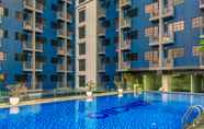 Swimming Pool 7 Elegant Studio Room at Evenciio Apartment Margonda By Travelio