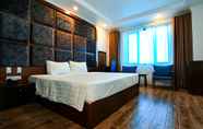 Bedroom 4 NewDay Hotel
