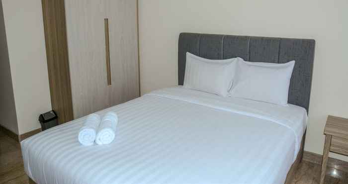 Kamar Tidur Elegant and Tidy Studio Apartment @ Menteng Park By Travelio