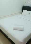 BEDROOM Comfortable 2BR at Pakubuwono Terrace Apartment By Travelio