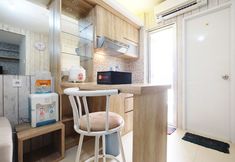 Bedroom 3 Cozy and Spacious 1BR Bassura City Apartment By Travelio