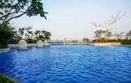 Swimming Pool 5 New Furnished Studio near Puri Indah at West Vista Apartment By Travelio