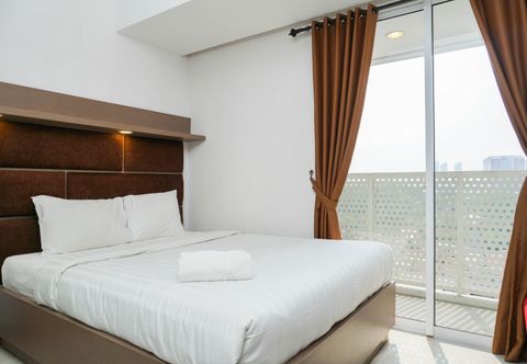 Bedroom New Furnished Studio near Puri Indah at West Vista Apartment By Travelio